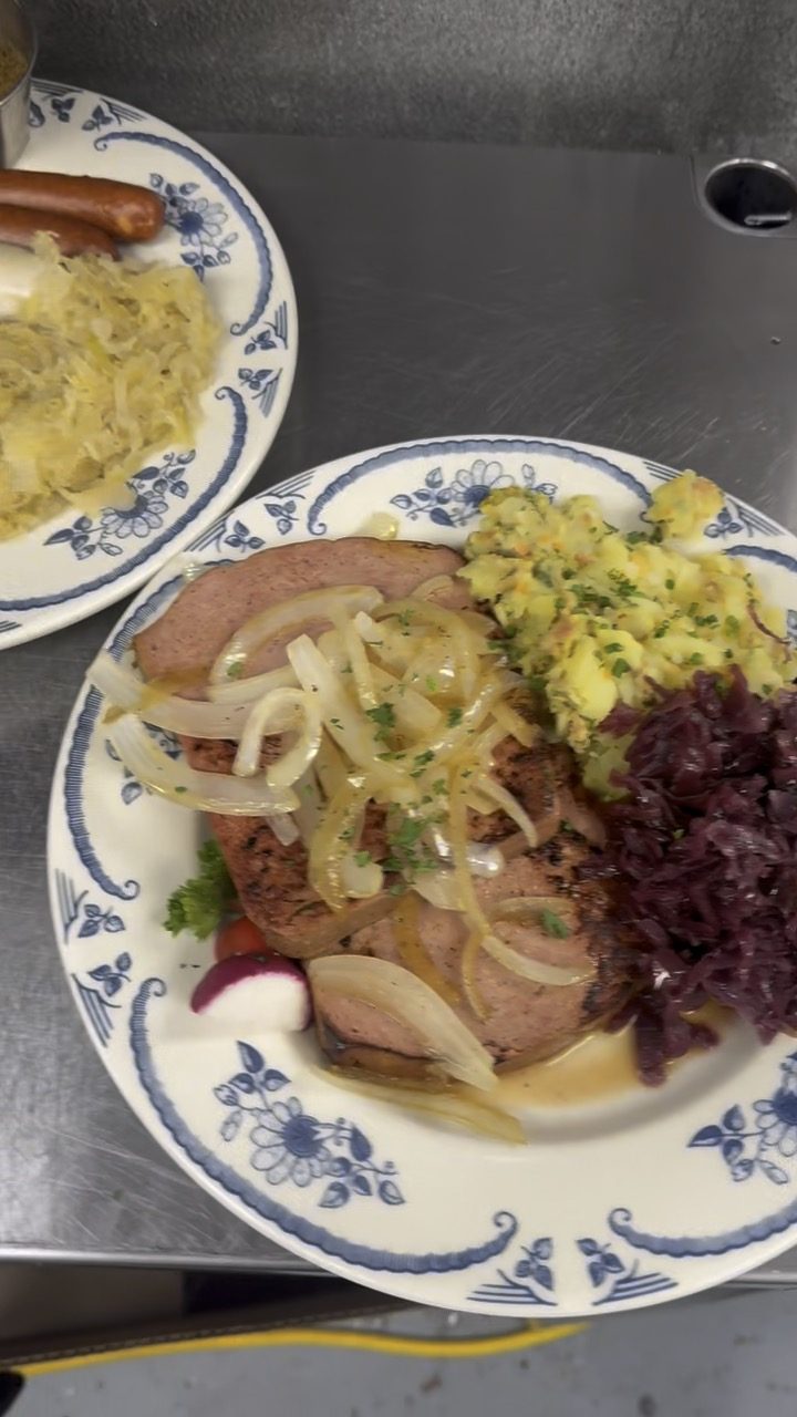 Leberkäse with onions, potato salad, and Rotkraut